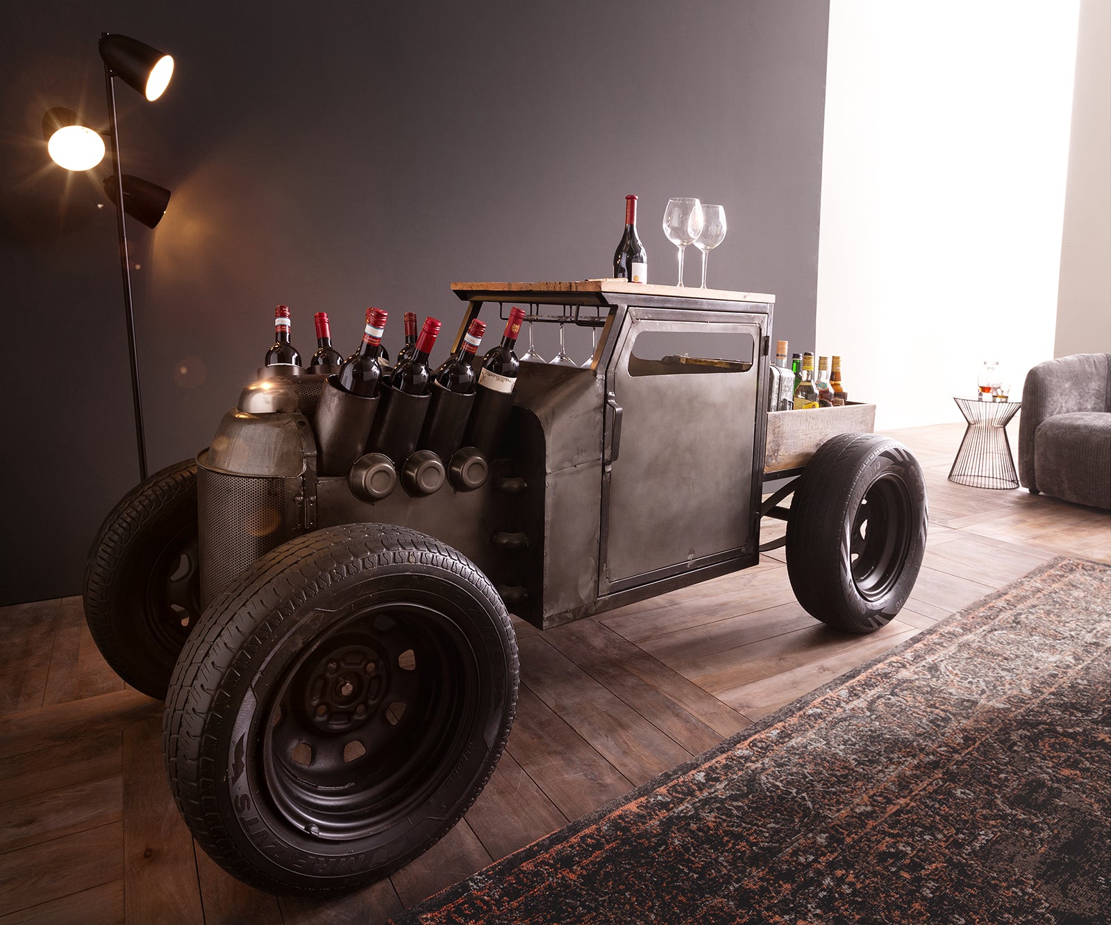 Vintage car-inspired bar cart with wine bottle holders.