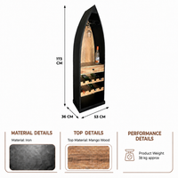 Boat shaped bar cabinet made of iron with mango wood storage shelves and wine bottle racks, measuring 53 cm wide, 36 cm deep and 173 cm high.