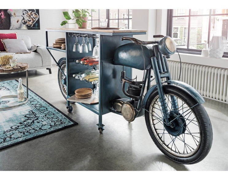 Motorcycle bar table with industrial design and storage.


