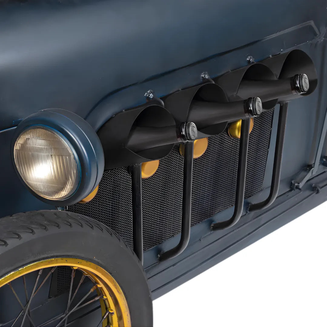 Racing theme bar counter with bold design, bottle storage and durable wooden and iron build by Foxfurn