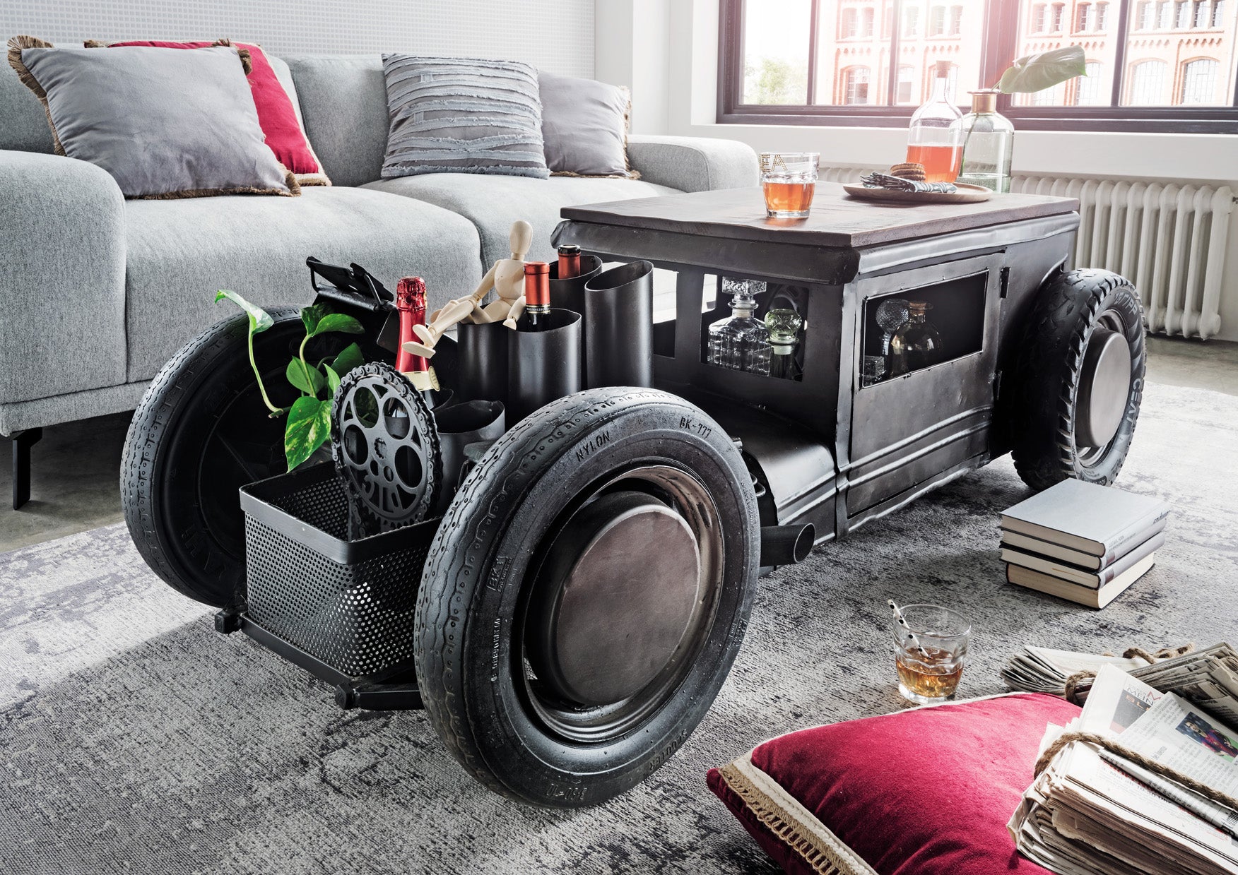 Car-inspired coffee table with industrial design and storage.