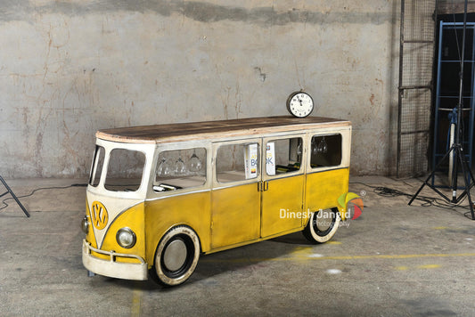 Yellow VW van-inspired bar counter with wooden top.