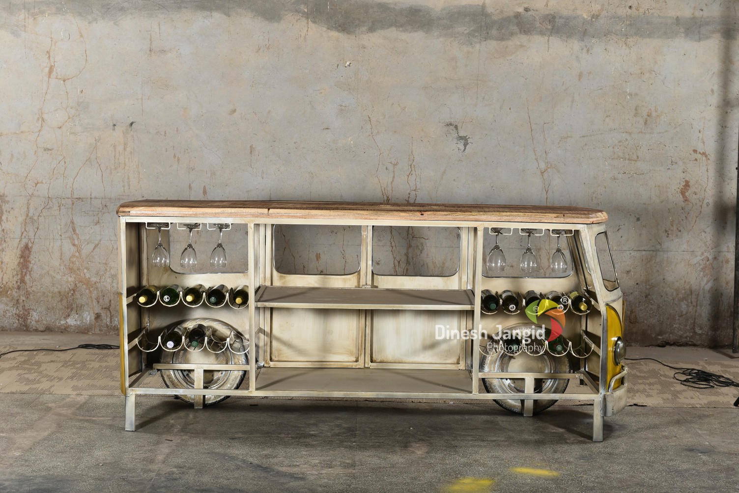 VW van-themed bar counter with a rustic wood surface