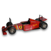 Alt Text: Luxury racer coffee table with sleek automotive design and premium finish, perfect for modern living room interiors