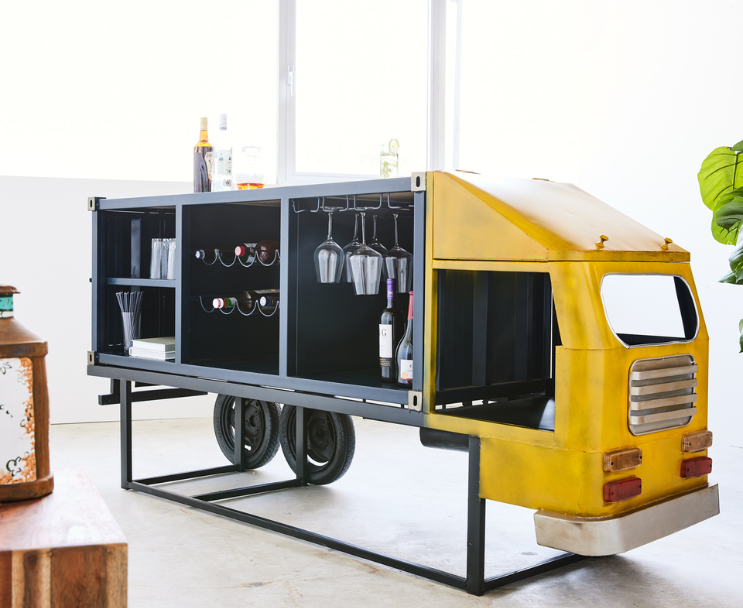 Truck bar table with container design and bold yellow accents