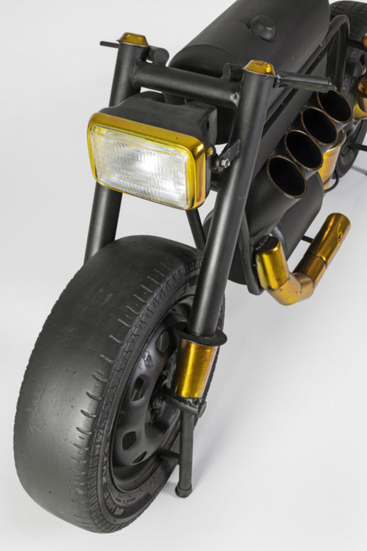 Stylish motorcycle bar table with metal frame and wooden surface