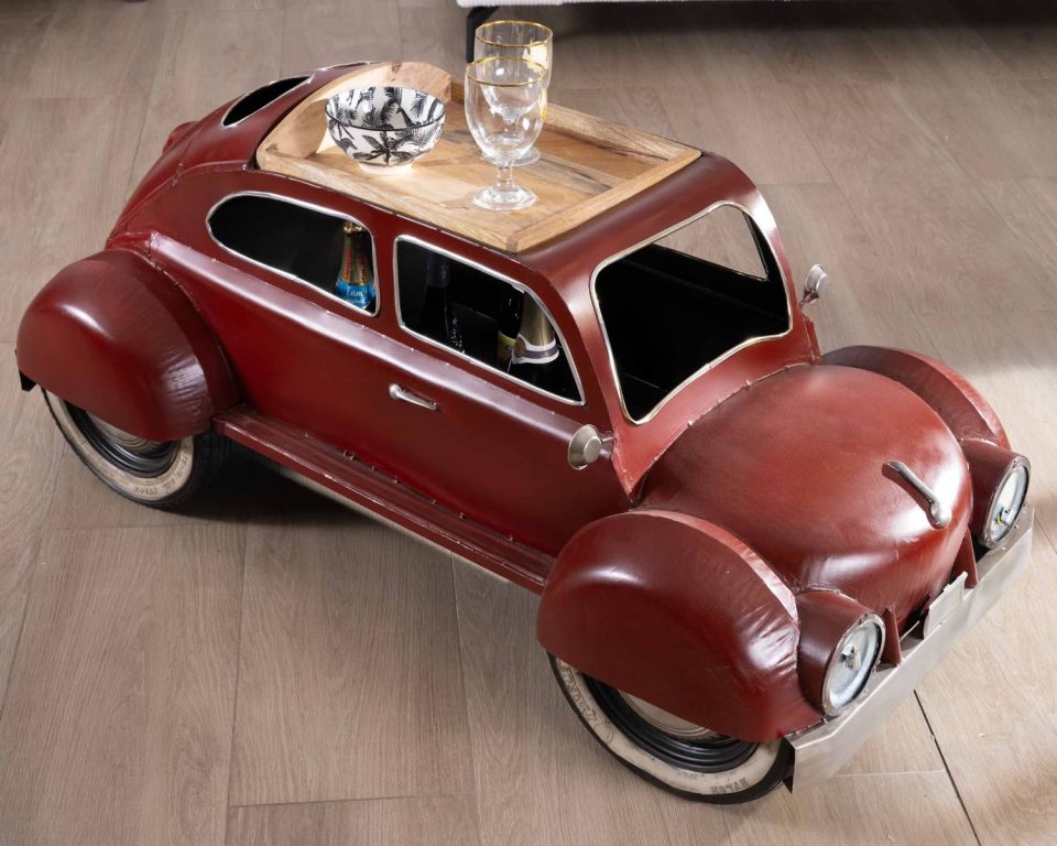Vintage car-shaped coffee table with wooden top.