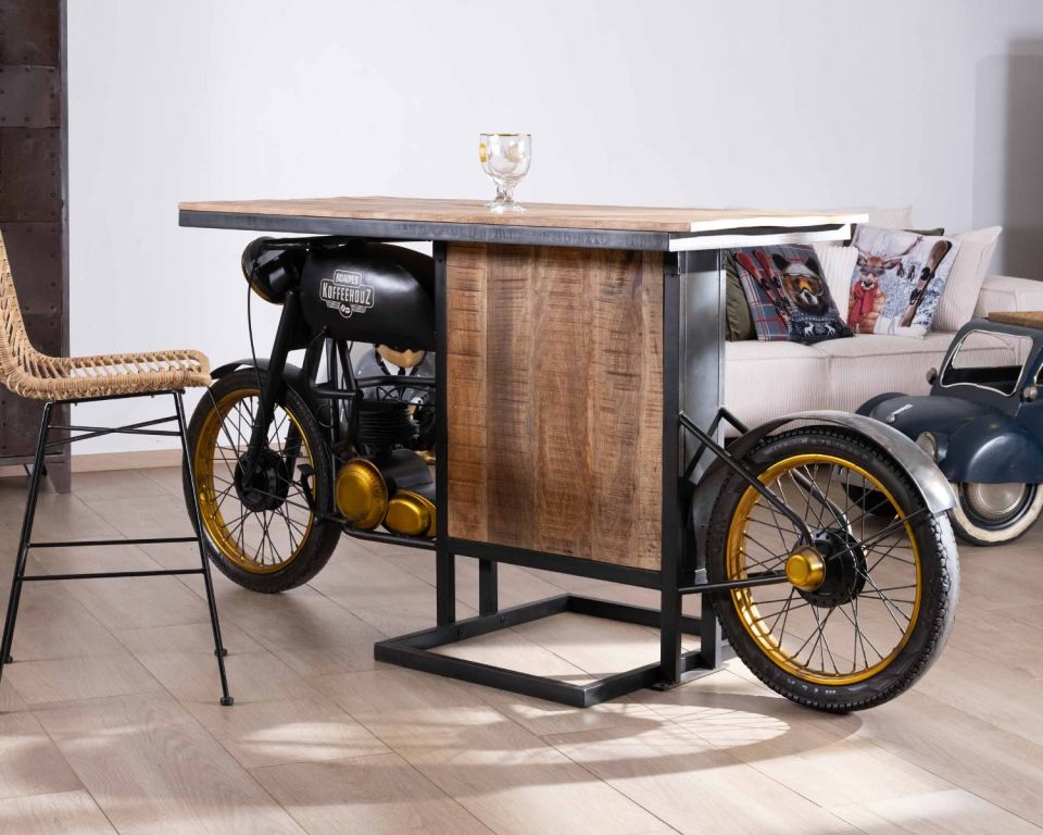 Bar table with a motorcycle base and wooden top.