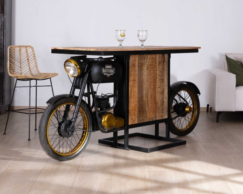 Bar table with a motorcycle-inspired base and wooden top