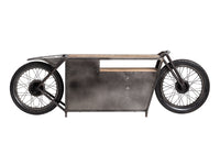 Unique table with a motorcycle base and wine rack